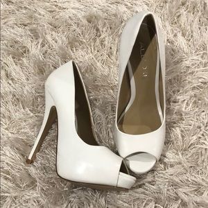 Classic white peep toe pumps